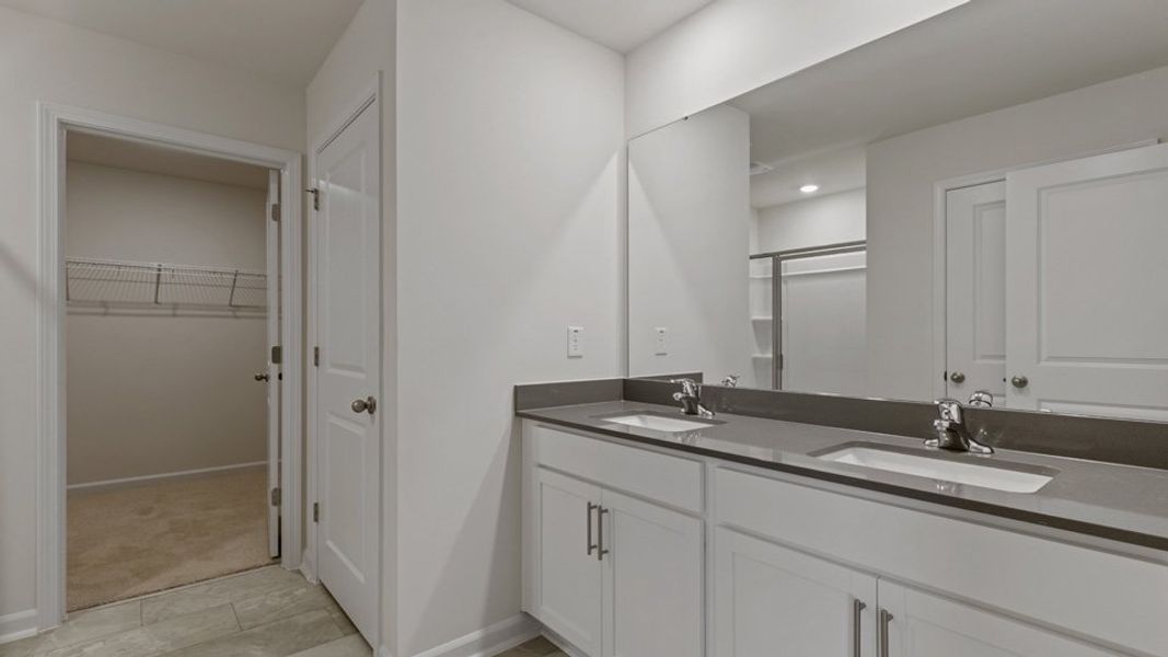 Representative furnished interior of a home built from the hanover by D.R. Horton in Bexford, Willow Spring (Image 10).