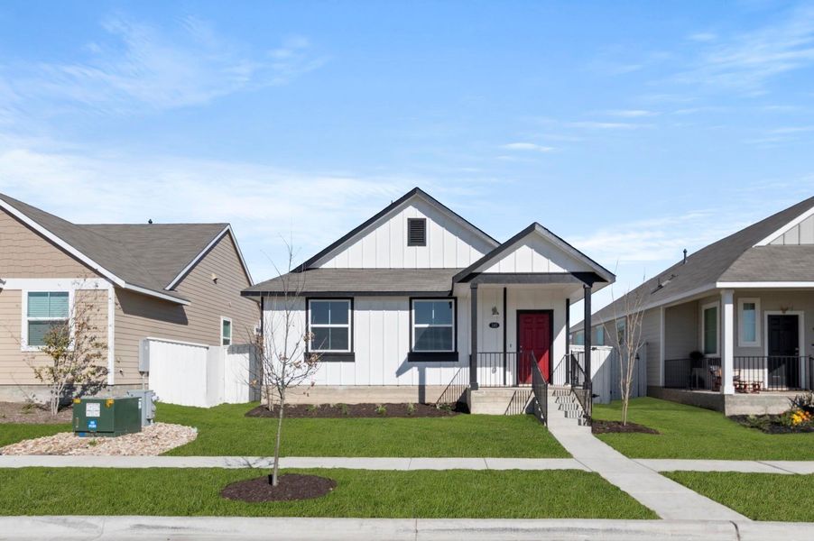 Front exterior of a new home in Casetta Ranch, Kyle, TX, highlighting curb appeal (Image 21).