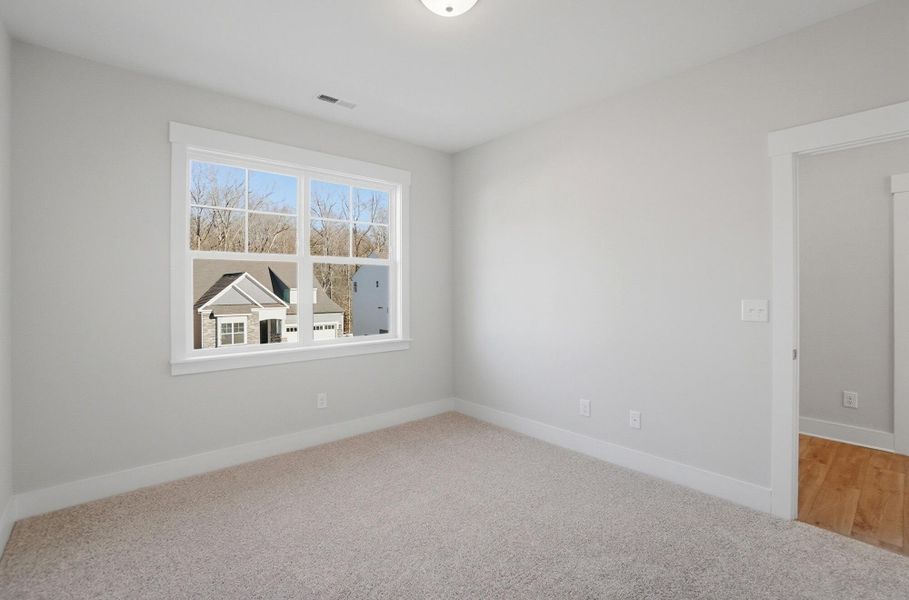 Spacious, unfurnished interior of a new home in Rone Creek, Waxhaw (Image 74).