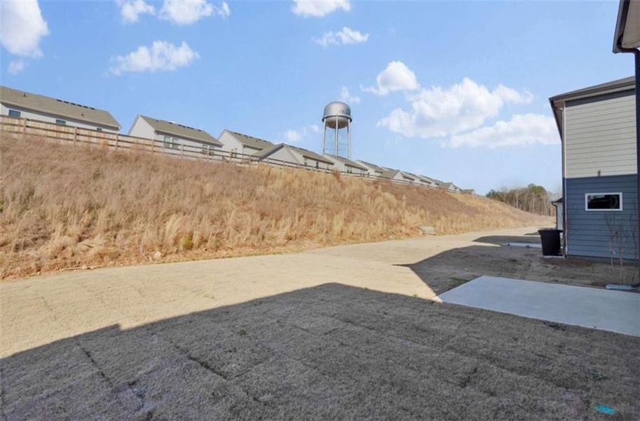 Front exterior of a new home in Hawthorne Station, College Park, GA, highlighting curb appeal (Image 2). Front exterior of a new home in Hawthorne Station, College Park, GA, highlighting curb appeal (Image 2).