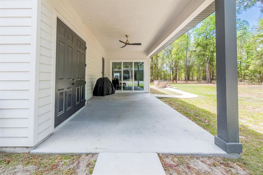 Exterior details and patio area of a home in , Fort White (Image 23).