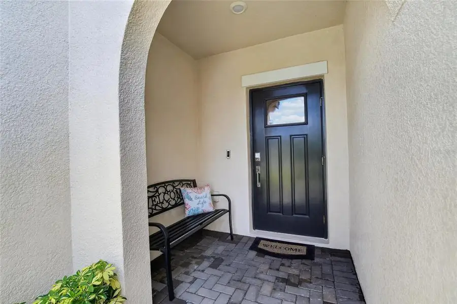 Exterior details and patio area of a home in Southshore Bay Active Adult, Wimauma (Image 3).