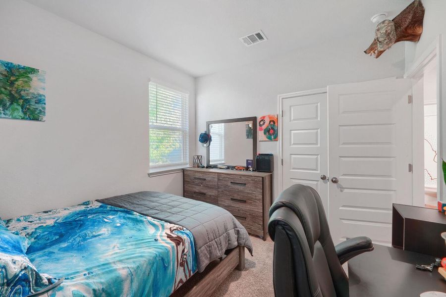 Furnished interior view inside a new home in Stallion Run, Buda (Image 20).