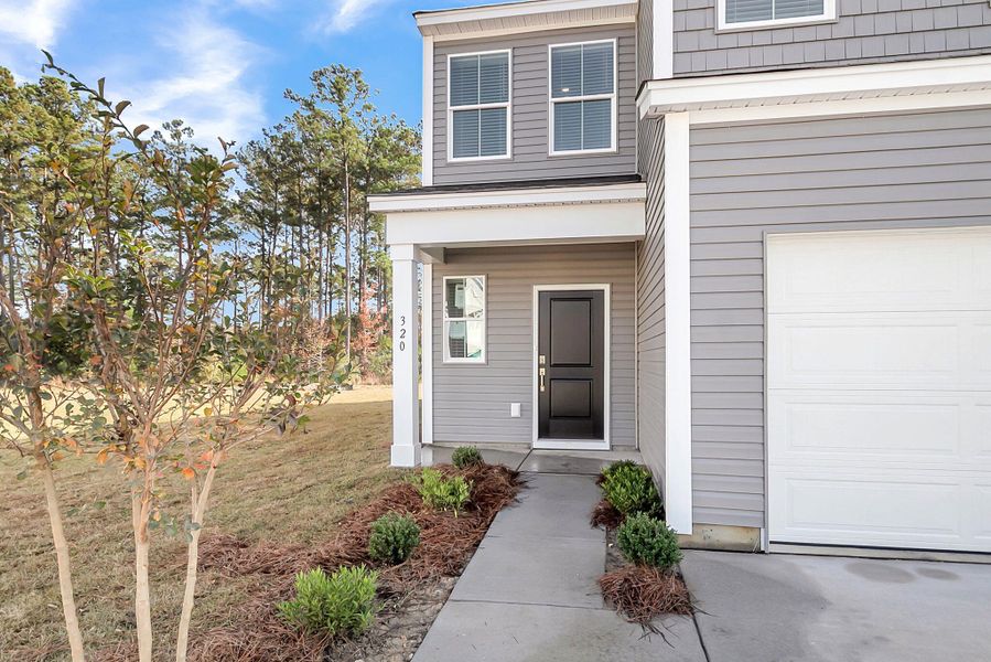 Exterior details and patio area of a home in Wildcat Chase, Summerville (Image 3).