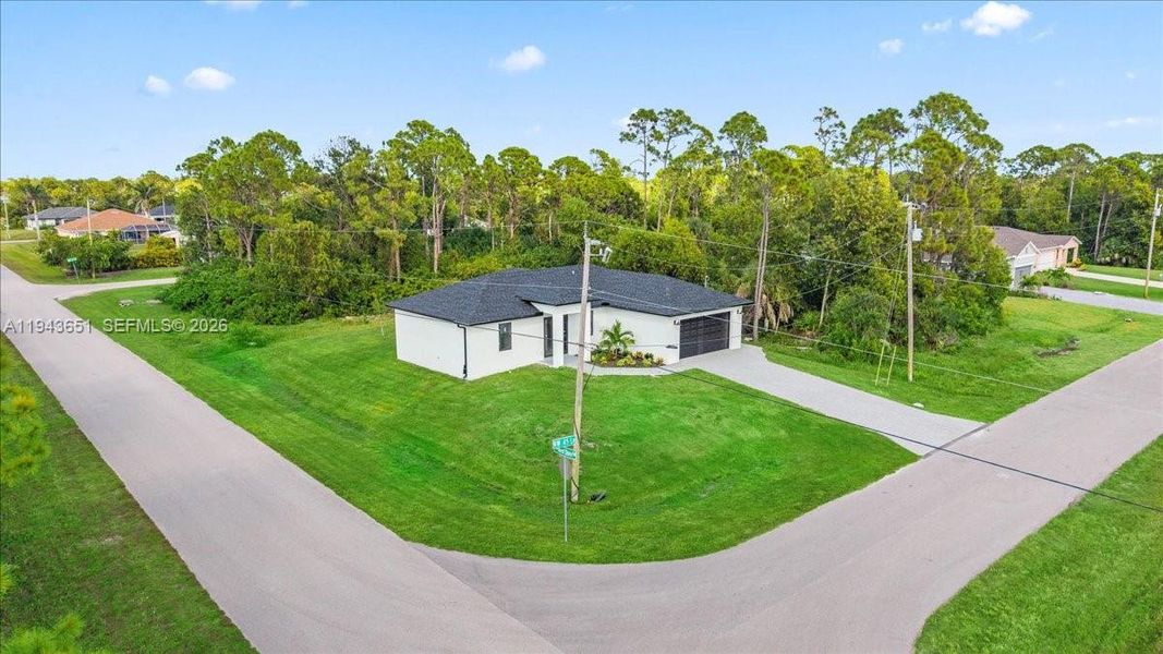 Front exterior of a new home in , Cape Coral, FL, highlighting curb appeal (Image 17).
