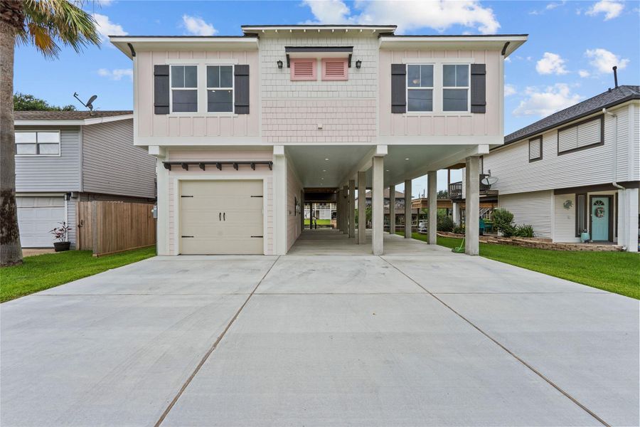 Front exterior of a new home in , Bayou Vista, TX, highlighting curb appeal (Image 1).