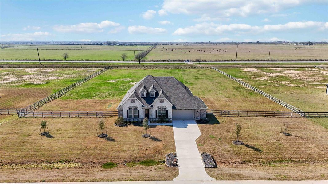 Front exterior of a new home in , Waller, TX, highlighting curb appeal (Image 24).