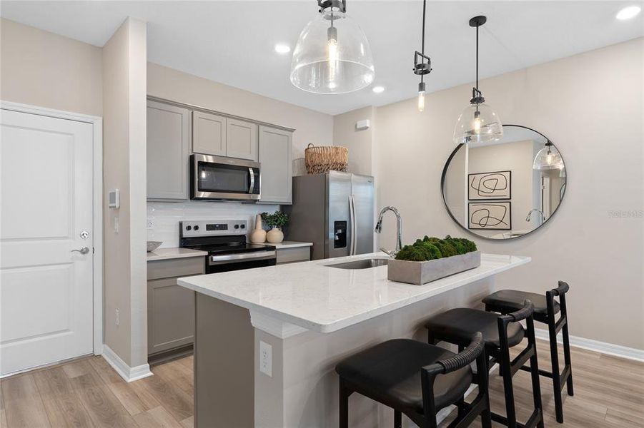 Furnished interior view inside a new home in EverBe, Orlando (Image 9).