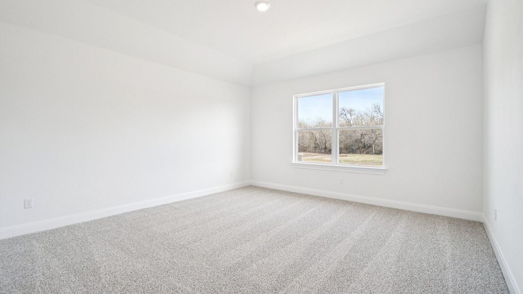 Spacious, unfurnished interior of a new home in Railhead, Cedar Creek (Image 24).