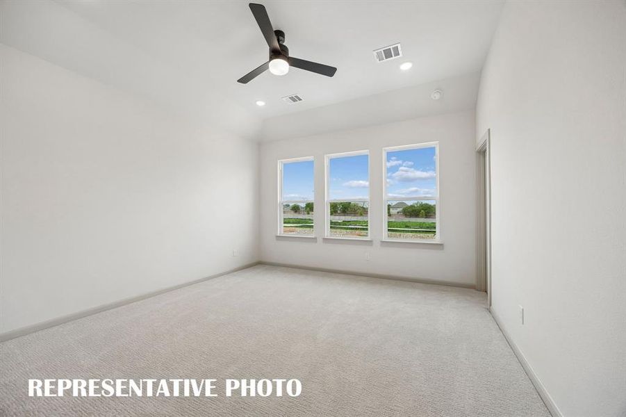 Your dreamy new owner's suite is located at the rear of the home for additional privacy.  REPRESENTATIVE PHOTO