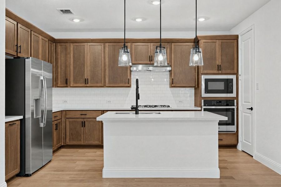 Furnished interior view inside a new home in Cross Creek Meadows, Celina (Image 5). Furnished interior view inside a new home in Cross Creek Meadows, Celina (Image 5).