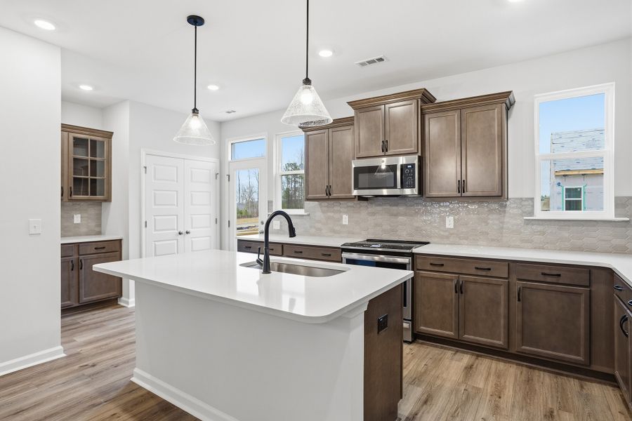 Furnished interior view inside a new home in Renaissance at White Oak, Garner (Image 11).