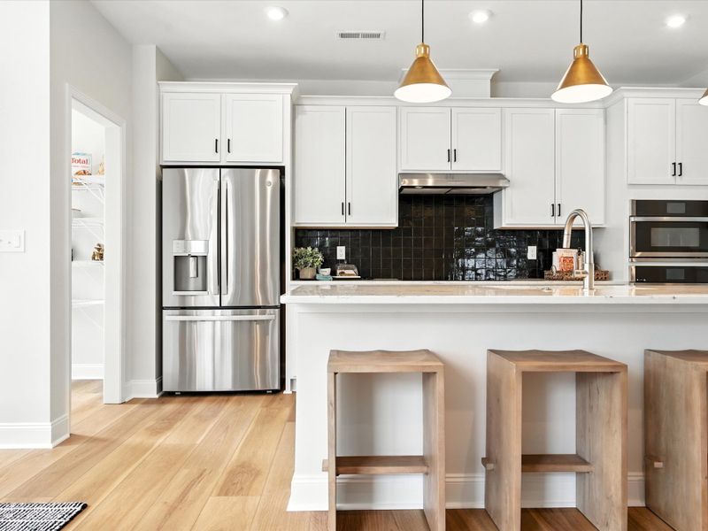 Representative furnished interior of a home built from the Beau by Tri Pointe Homes in Archer Row, Charlotte (Image 13).