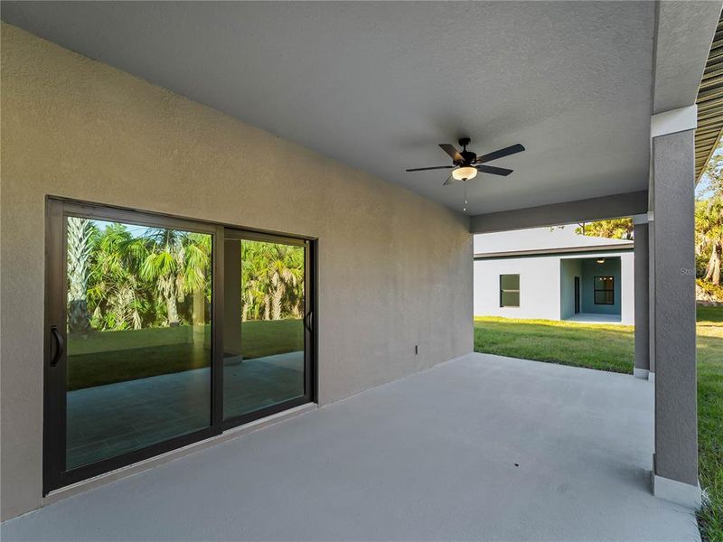 Exterior details and patio area of a home in , North Port (Image 39).