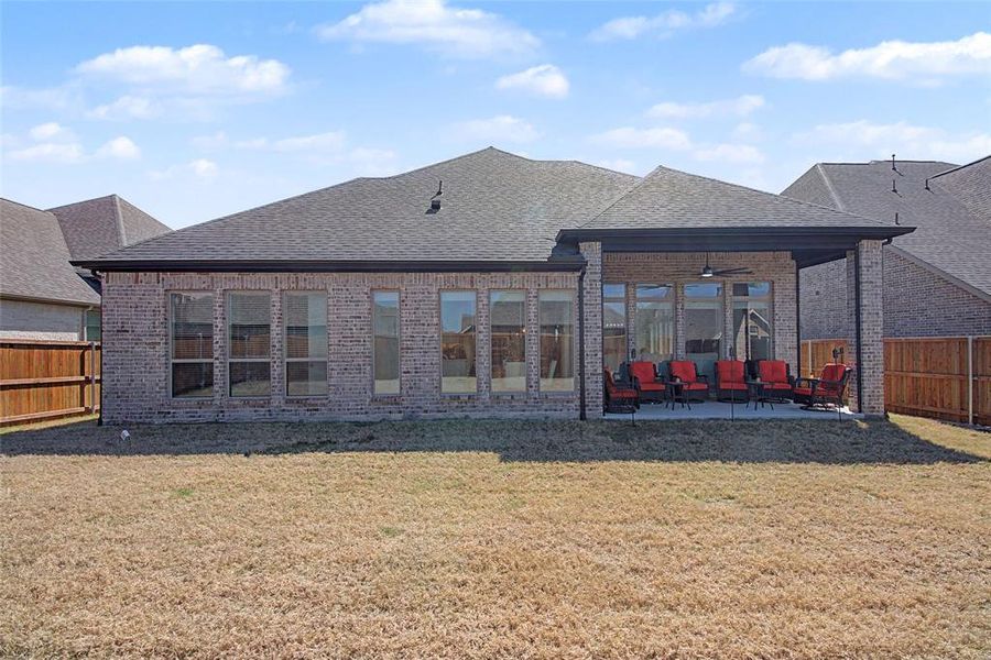 Exterior details and patio area of a home in Devonshire, Forney (Image 3).