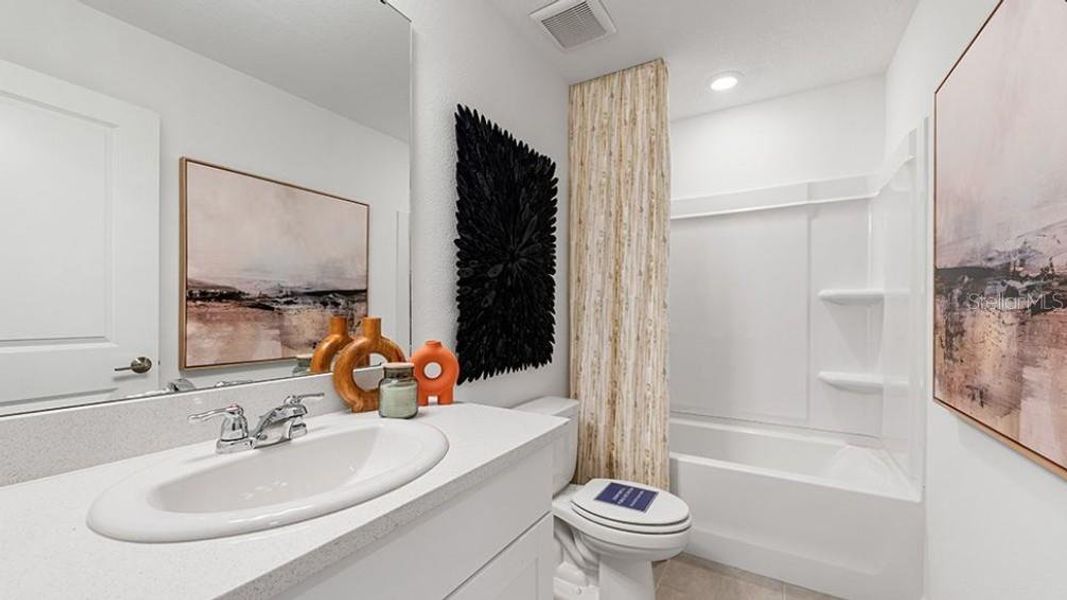 Furnished interior view inside a new home in Waterstone, Groveland (Image 8).