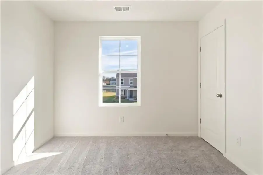 Spacious, unfurnished interior of a new home in The Ridge at Twin Rivers, Covington (Image 26).