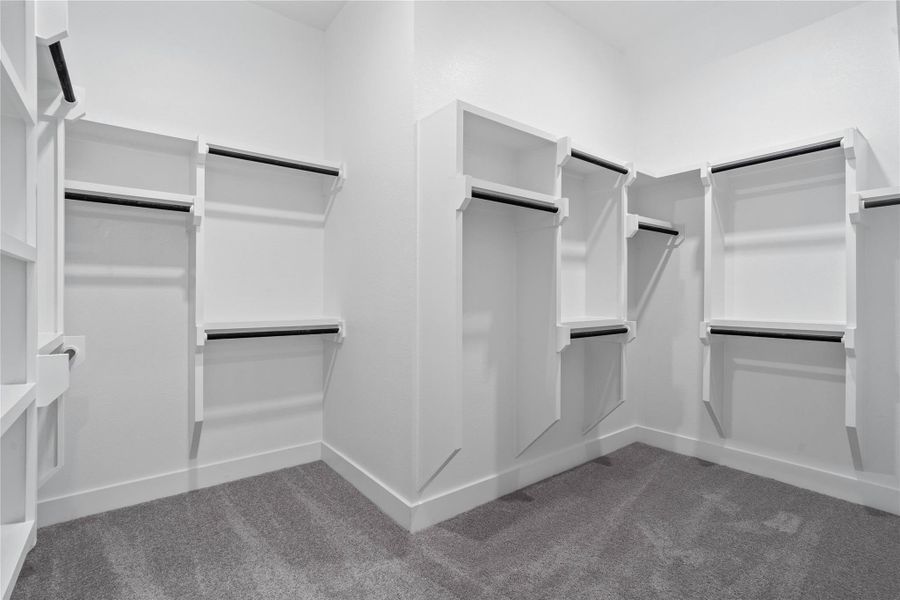 Look at this immaculate closet! With high shelving, multiple rows to hang clothing, you are sure to have enough room for all your belongings!