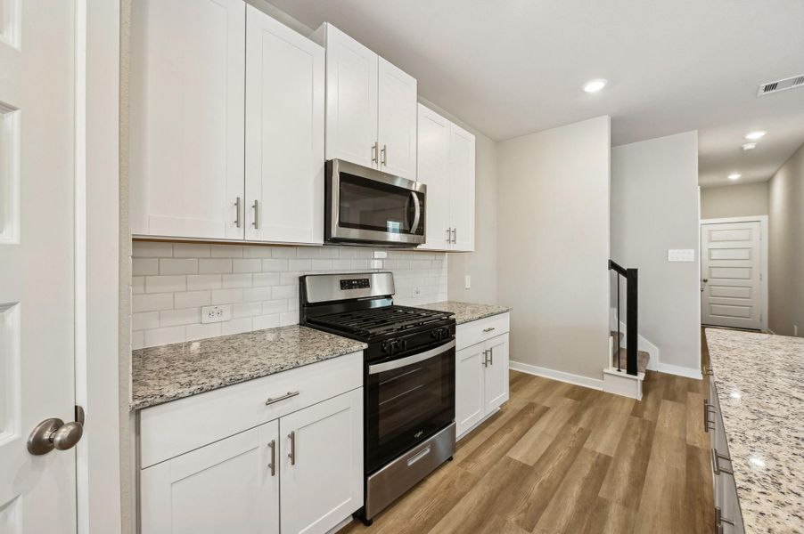 Photo is not of the actual home, but is an inspirational photo of builder’s model home and may depict options, furnishings, and/or decorator features that are not included