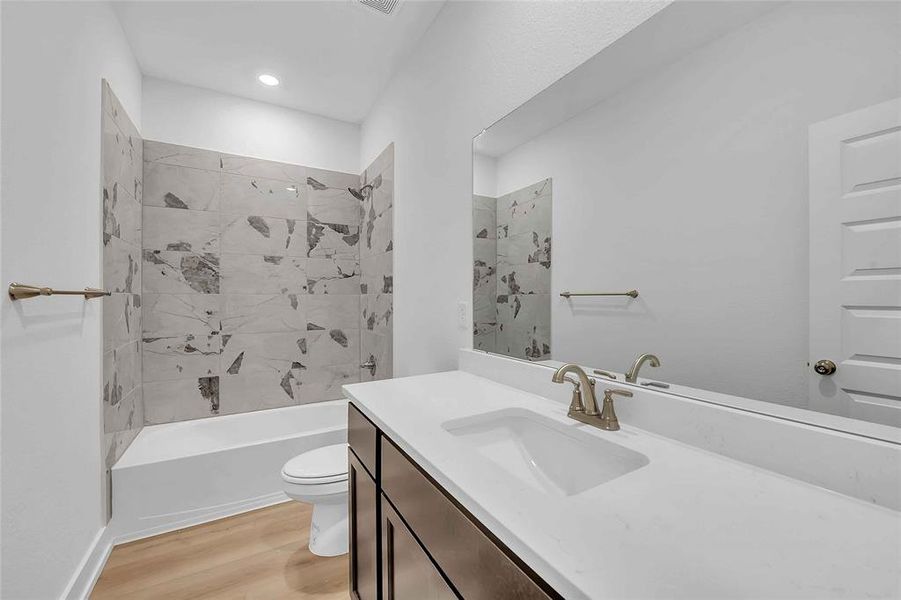 Please Note: These interior photos are not of the actual home but are of a completed one with a similar floor plan. Finishes, features, and layouts may vary.