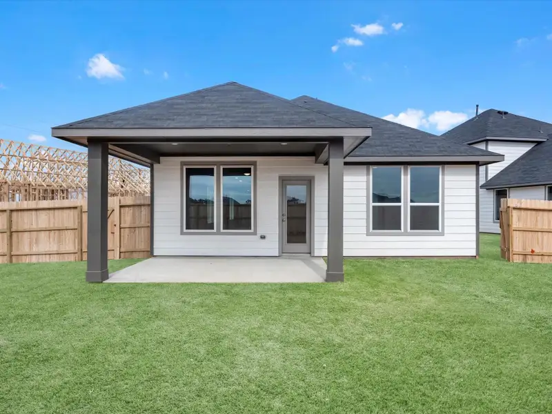 Exterior details and patio area of a home in Mason Woods, Cypress (Image 3). Exterior details and patio area of a home in Mason Woods, Cypress (Image 3).