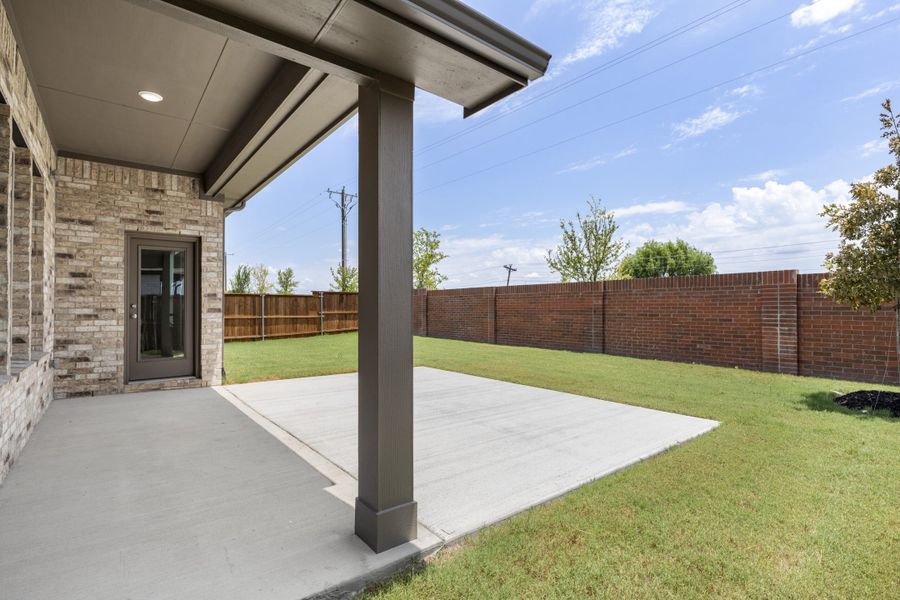 Exterior details and patio area of a home in River Ranch, Van Alstyne (Image 3). Exterior details and patio area of a home in River Ranch, Van Alstyne (Image 3).