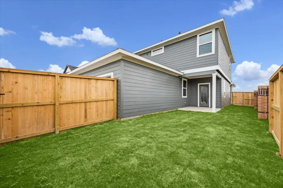 Exterior details and patio area of a home in Elyson, Katy (Image 21).