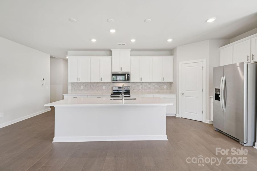 Photo is not of the actual home, but is an inspirational photo of builder’s model home and may depict options, furnishings, and/or decorator features that are not included Photo is not of the actual home, but is an inspirational photo of builder’s model home and may depict options, furnishings, and/or decorator features that are not included