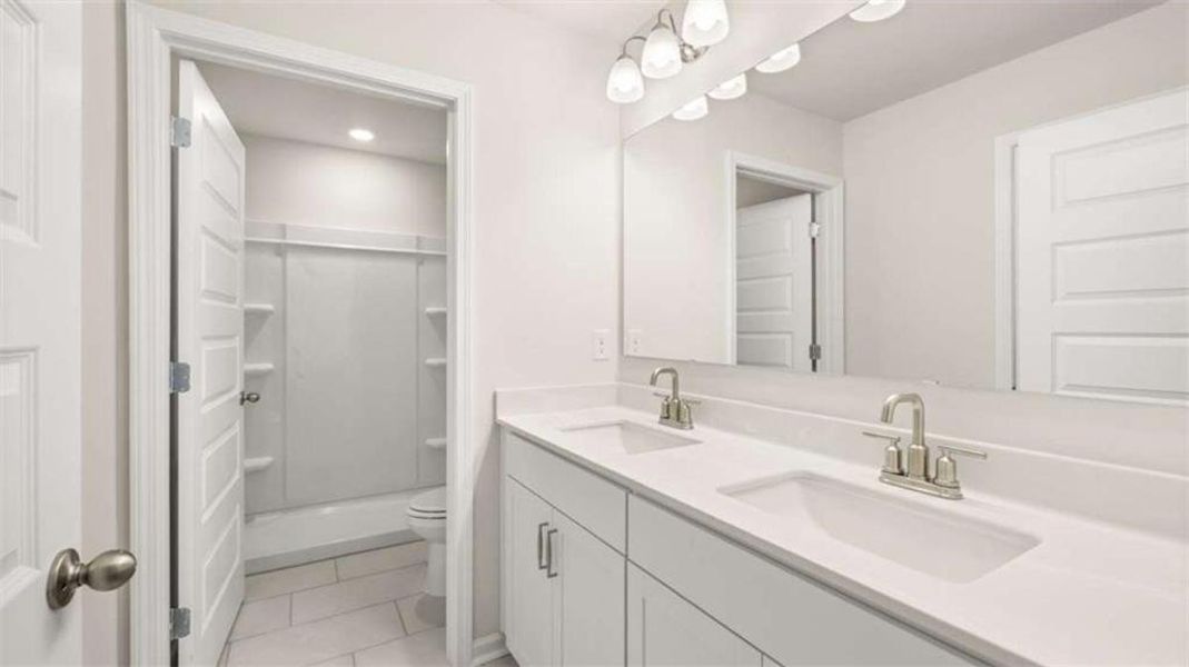 Furnished interior view inside a new home in Water Oak Estates, Lawrenceville (Image 16).