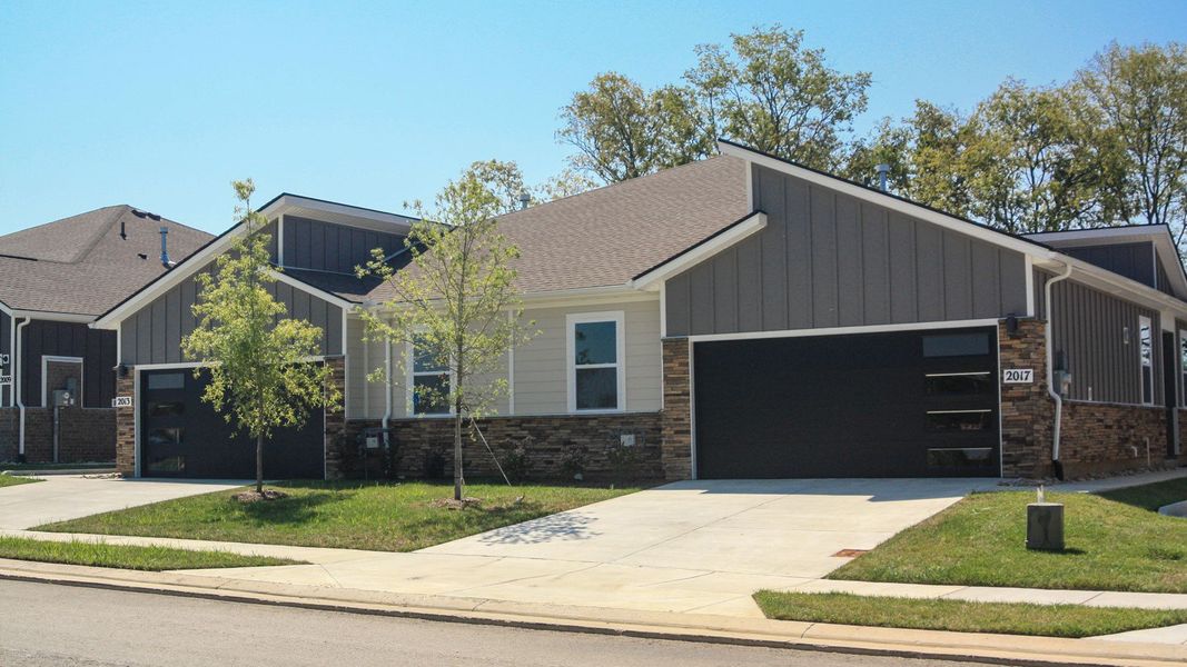 Front exterior of a new home in Nexus South, Gallatin, TN, highlighting curb appeal (Image 2).