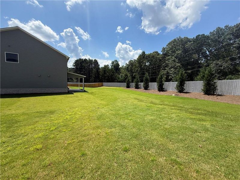 Exterior details and patio area of a home in , Hoschton (Image 21). Exterior details and patio area of a home in , Hoschton (Image 21).