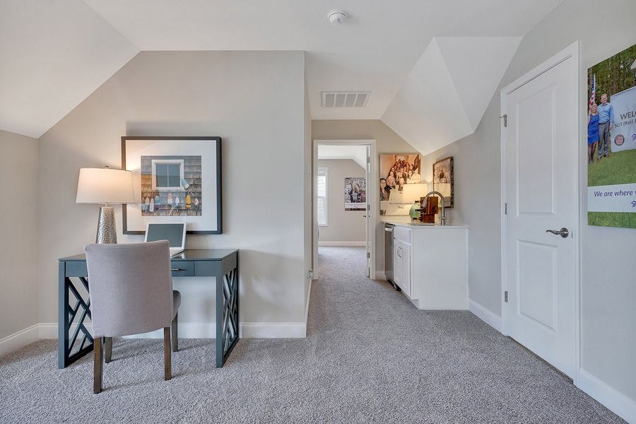 Representative furnished interior of a home built from the Promenade by McKee Homes in The Cottages at 78 North, Sanford (Image 29).