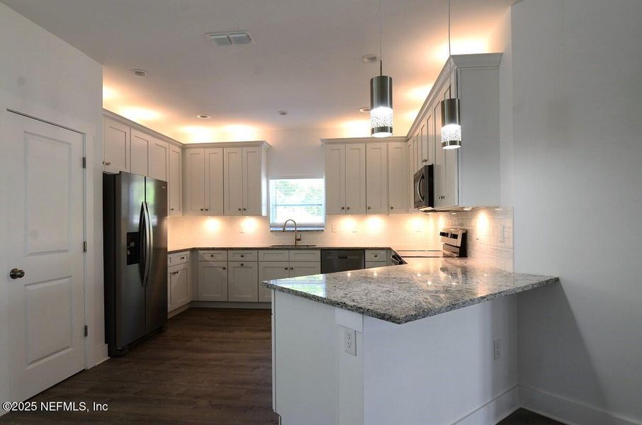 Furnished interior view inside a new home in , Jacksonville (Image 6). Furnished interior view inside a new home in , Jacksonville (Image 6).