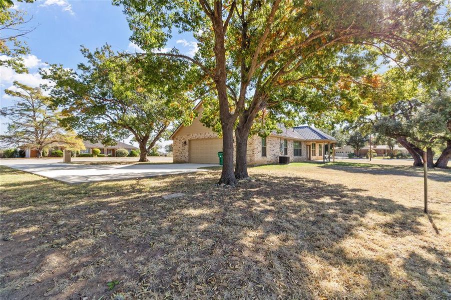 Gorgeous live oaks surround the home