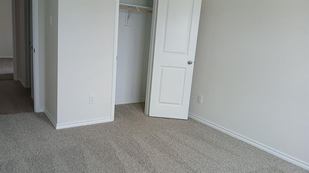 Neutral-toned carpeting and light-colored walls provide a versatile backdrop Neutral-toned carpeting and light-colored walls provide a versatile backdrop