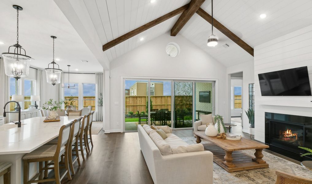 Kitchen adjacent to great room with fireplace