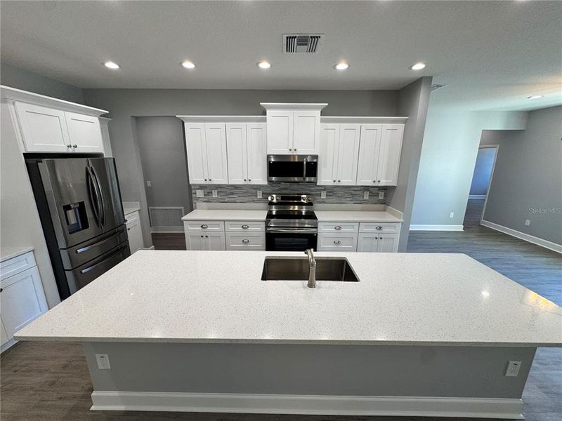 Furnished interior view inside a new home in , Dade City (Image 16).