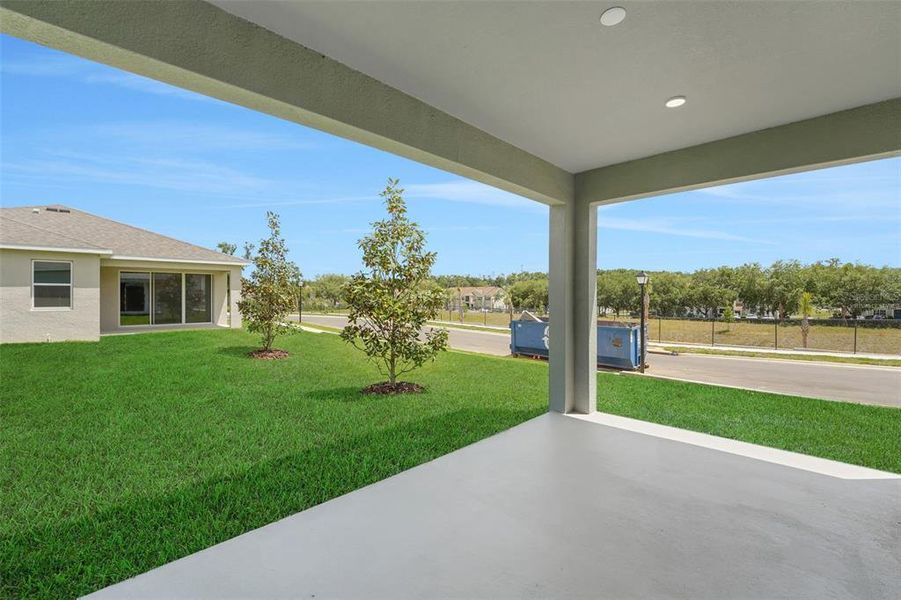 Exterior details and patio area of a home in Tuscan Hills, Dade City (Image 23).
