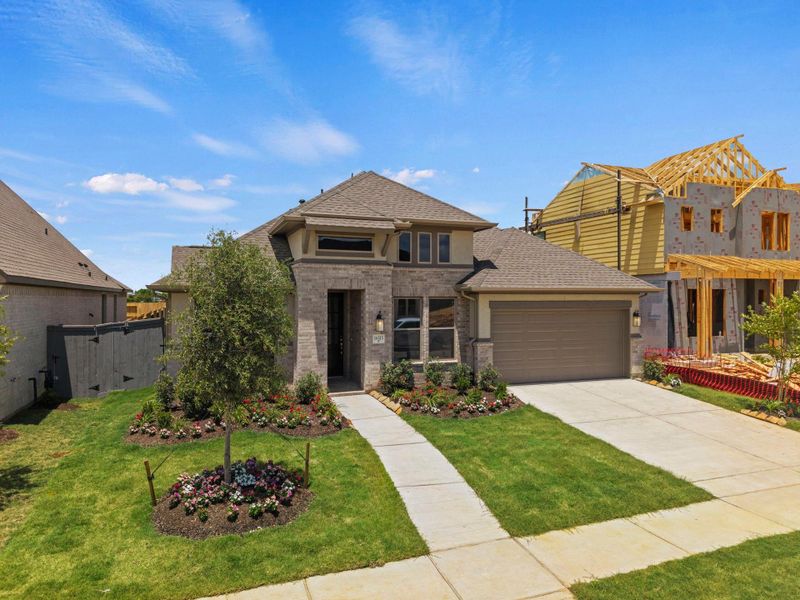 Front exterior of a new home in Jubilee, Hockley, TX, highlighting curb appeal (Image 21). Front exterior of a new home in Jubilee, Hockley, TX, highlighting curb appeal (Image 21).