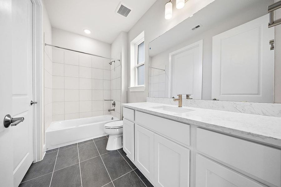 Representative furnished interior of a home built from the Dogwood by Caldwell Homes in The Highlands, Porter (Image 12). Representative furnished interior of a home built from the Dogwood by Caldwell Homes in The Highlands, Porter (Image 12).