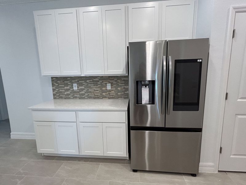 Furnished interior view inside a new home in Burnt Store, Cape Coral (Image 7). Furnished interior view inside a new home in Burnt Store, Cape Coral (Image 7).