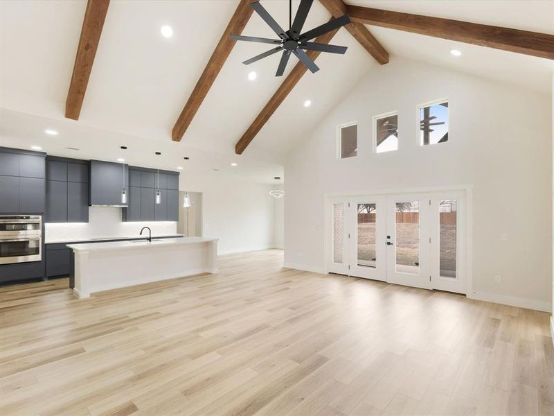 Unfurnished living room featuring recessed lighting and light wood finished floors