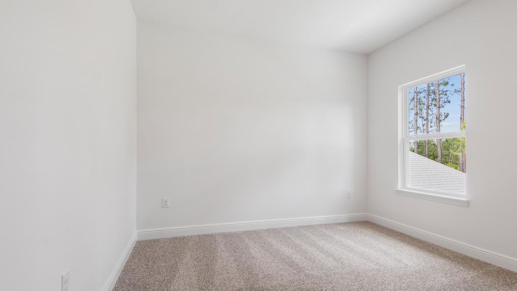 Spacious, unfurnished interior of a new home in Bayside at Ward Creek, Panama City Beach (Image 33).