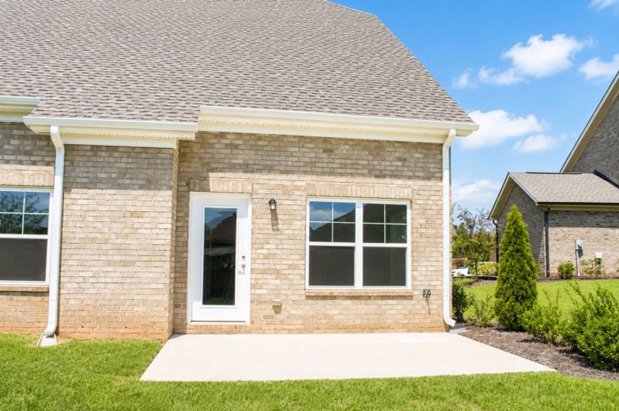 Exterior details and patio area of a home in Weybridge, Burlington (Image 4).