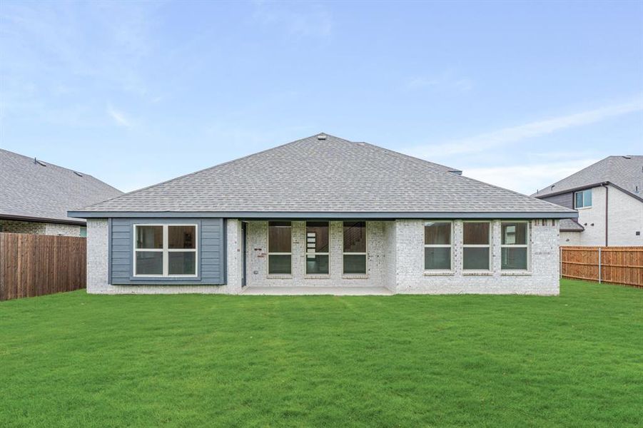 Front exterior of a new home in Hampton Park, Glenn Heights, TX, highlighting curb appeal (Image 1). Front exterior of a new home in Hampton Park, Glenn Heights, TX, highlighting curb appeal (Image 1).