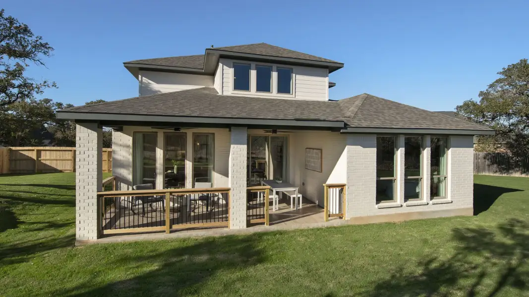 Front exterior of a new home in Parkside Peninsula, Georgetown, TX, highlighting curb appeal (Image 2). Front exterior of a new home in Parkside Peninsula, Georgetown, TX, highlighting curb appeal (Image 2).