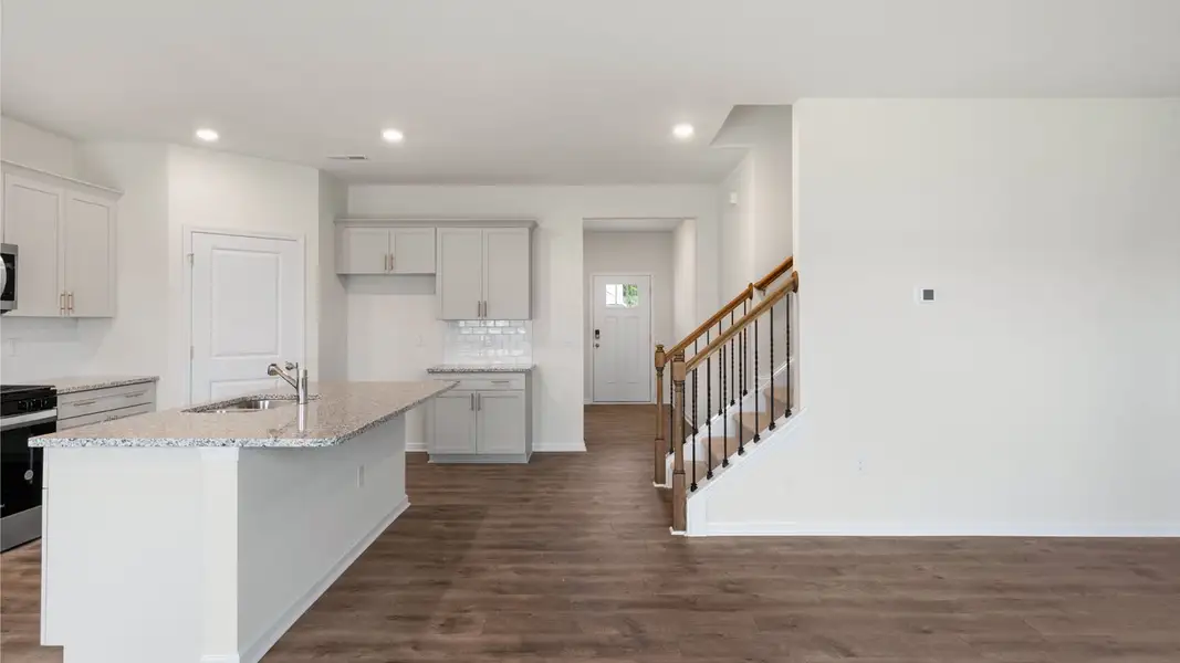 Furnished interior view inside a new home in The Reserve at Prestleigh, Wake Forest (Image 8).