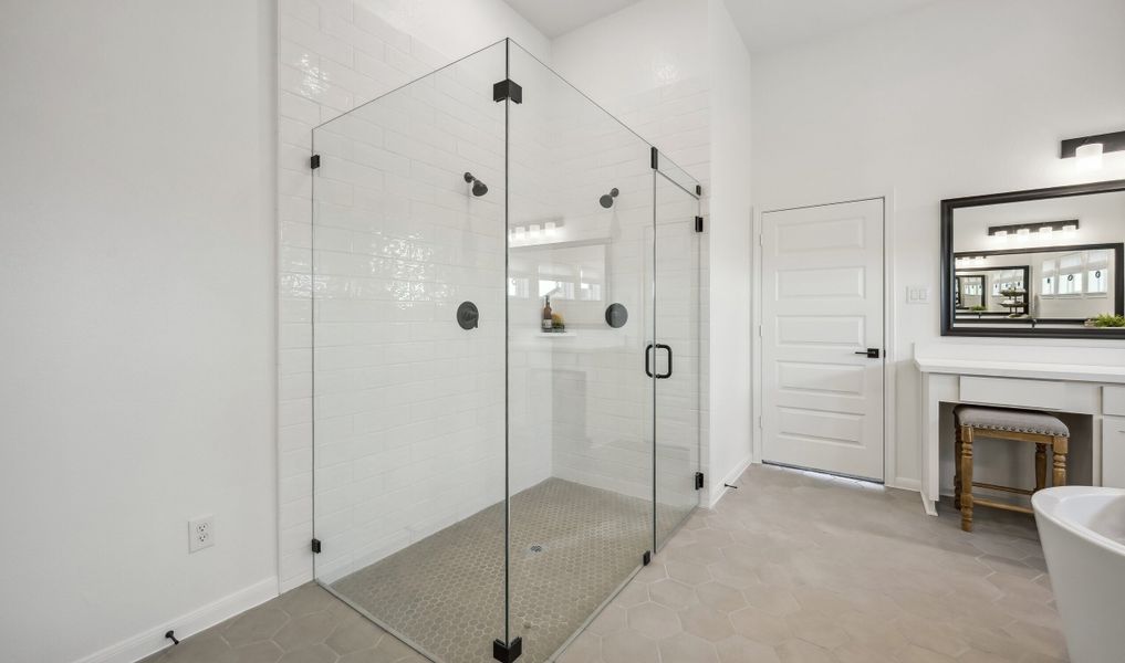 Frameless shower in primary suite