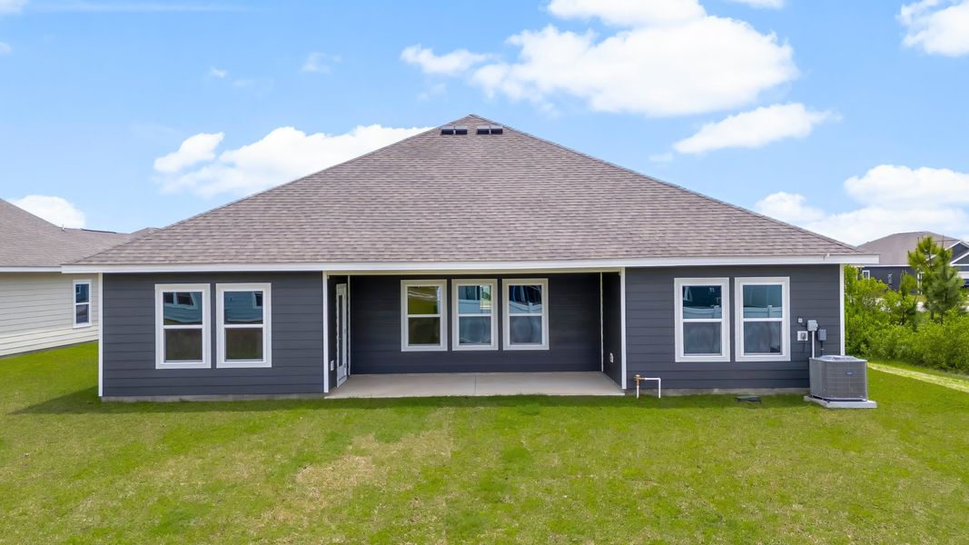Representative exterior photo of a completed home built from the The Victoria by D.R. Horton in Liberty, Panama City, FL (Image 28).