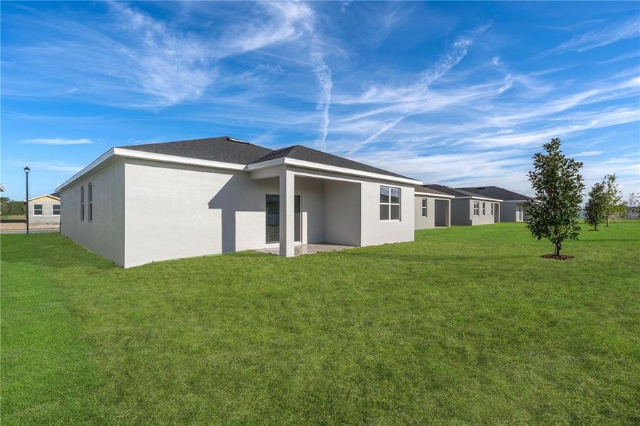 Exterior details and patio area of a home in Groves at Whitemarsh, Leesburg (Image 19).
